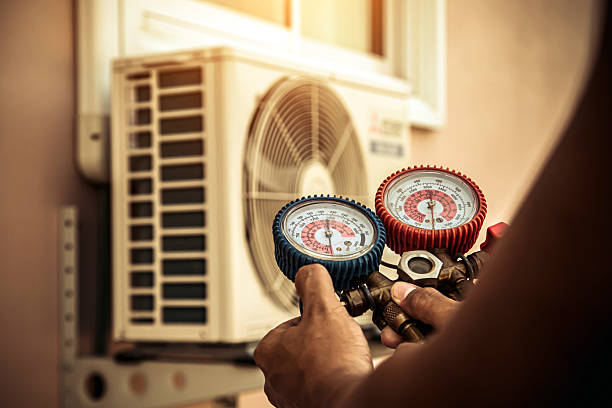 Professional Air Conditioning Service technician working in Yalaha, FL